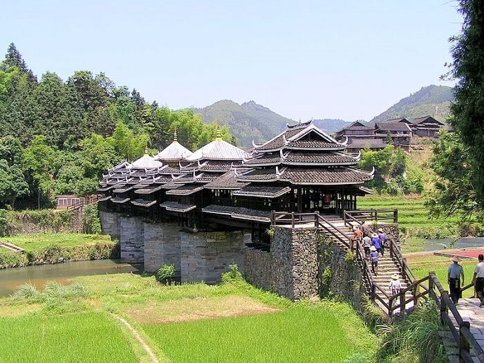 People climbing the stairs of Chengyang bridge